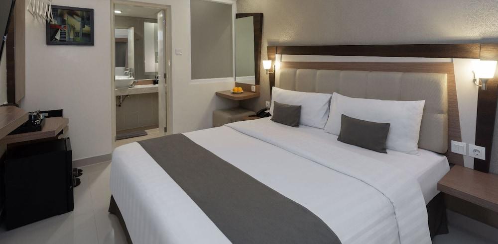 Hotel Neo - Kuta, Jelantik Legian Extérieur photo